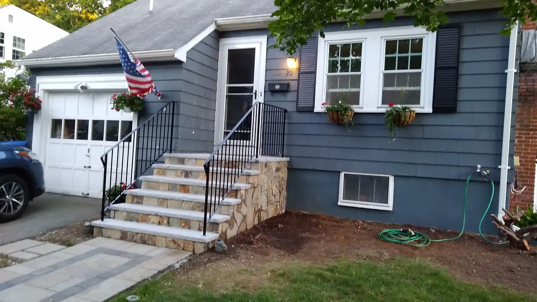 Iron handrail at an entry stoop