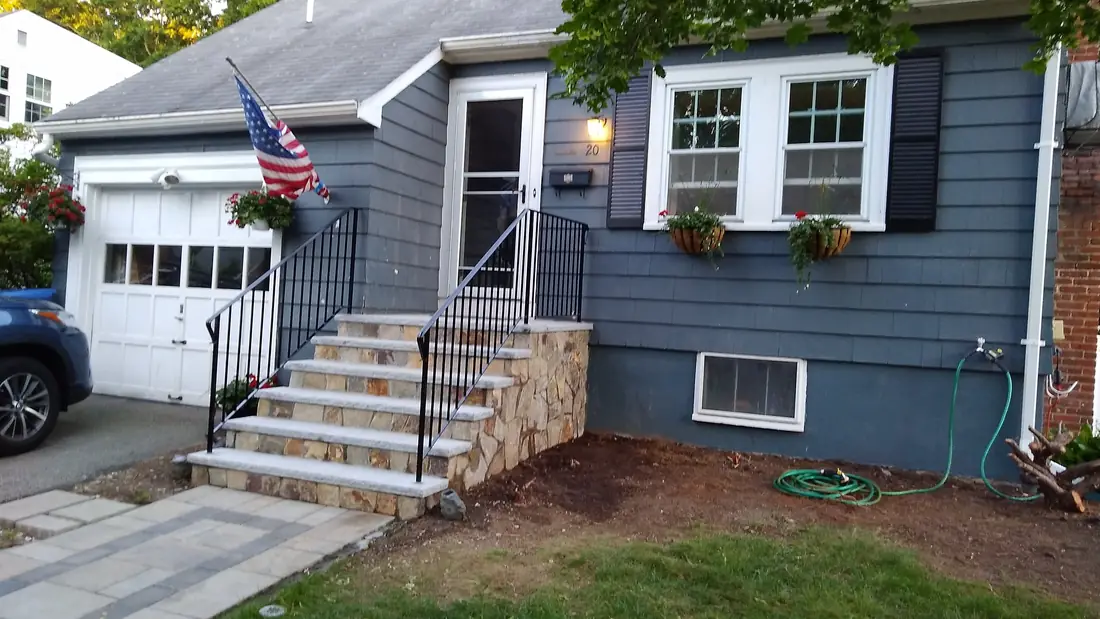 Iron handrail at an entry stoop