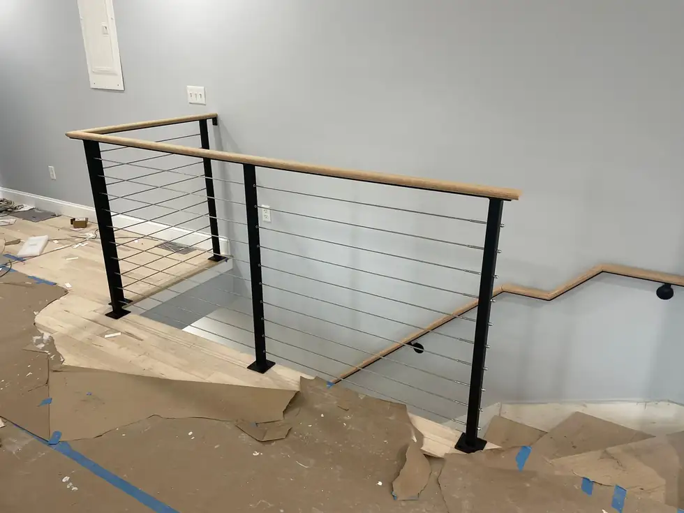 Interior cable railing along a hallway landing